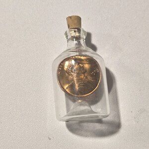1973 Lincoln Penny Encased In Miniature Glass Bottle With Cork Stopper, uncircul